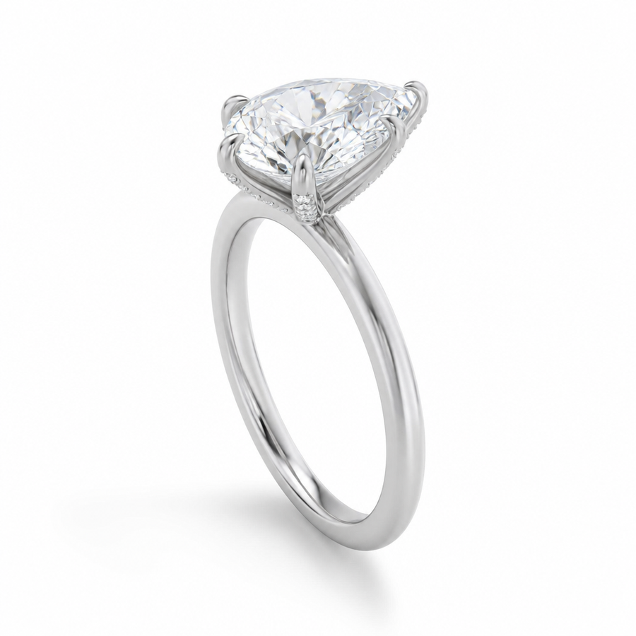 Pear Solitaire Ring With Pave Prongs