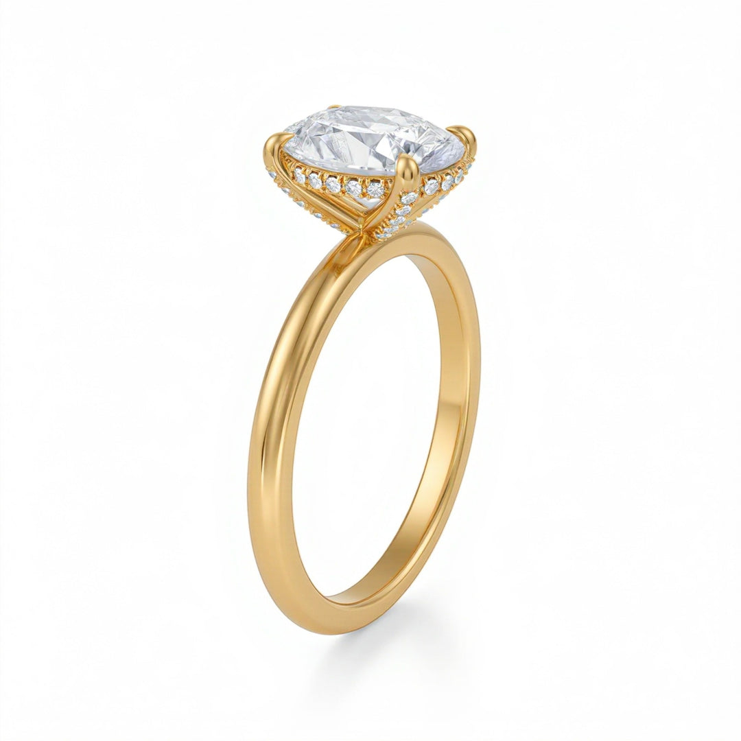 Gold ring with a large diamond on a white background