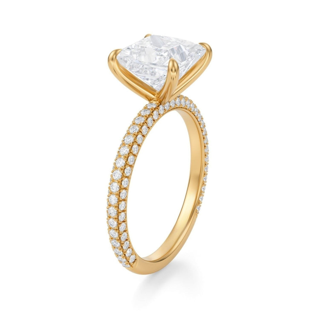 A princess-cut lab-created diamond ring with pave set on the band, displayed against a white background.