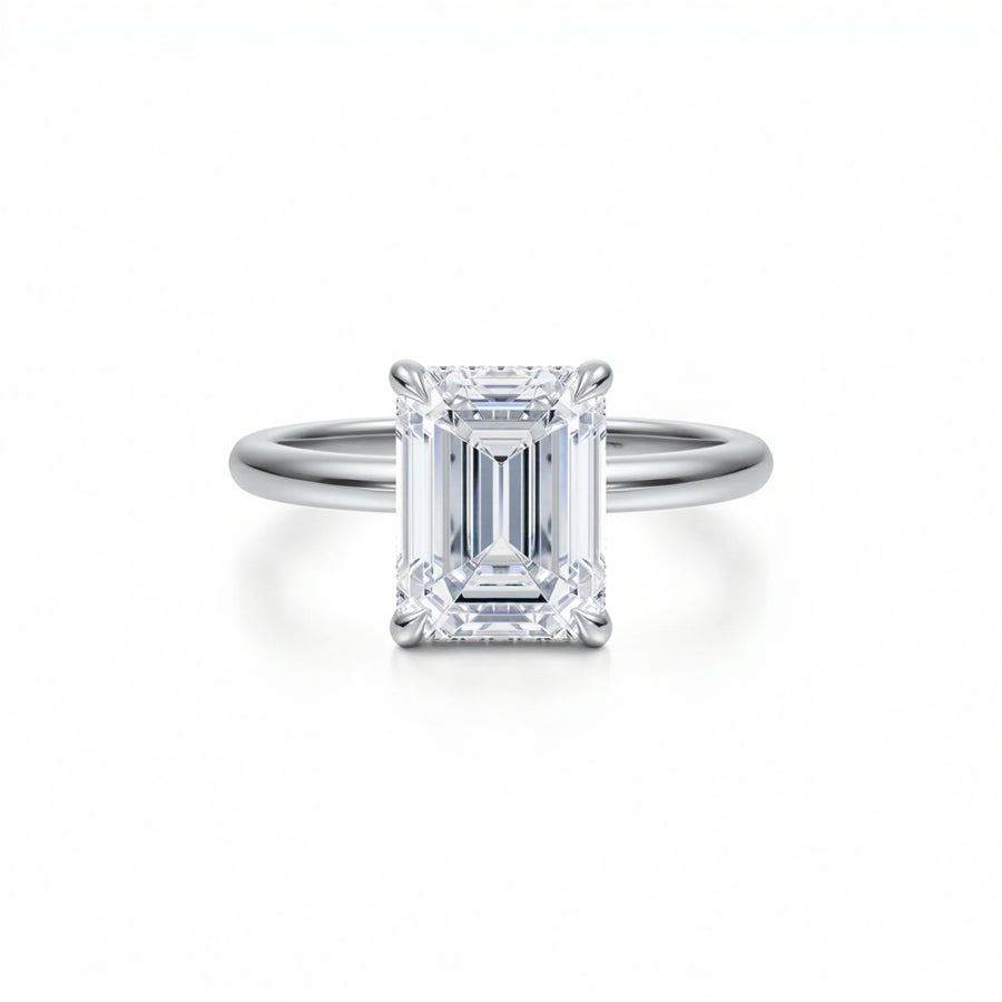 Emerald Solitaire Ring With Diamond Basket