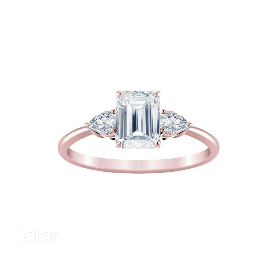 Emerald Trilogy Ring With Pear Side Stones