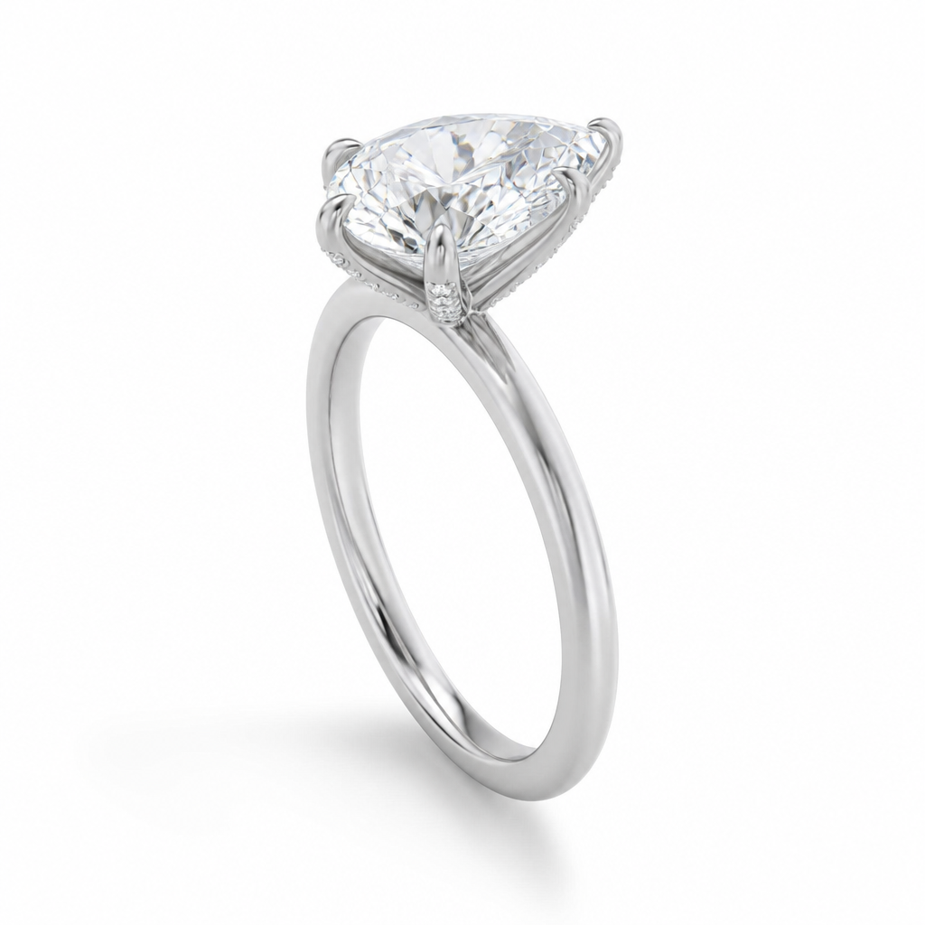Pear Solitaire Ring With Pave Prongs
