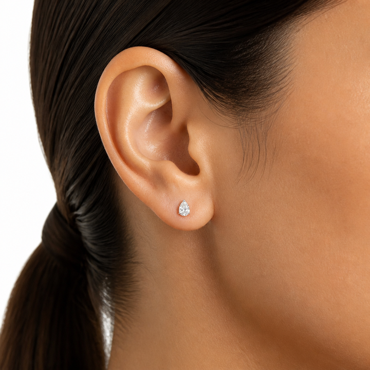 0.50 carat pear lab grown diamond stud earrings in 14K gold