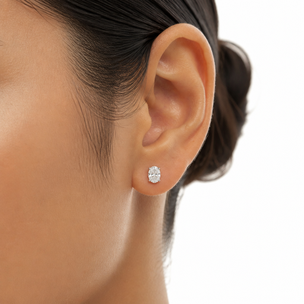 0.50 carat oval lab grown diamond stud earrings in 14K gold