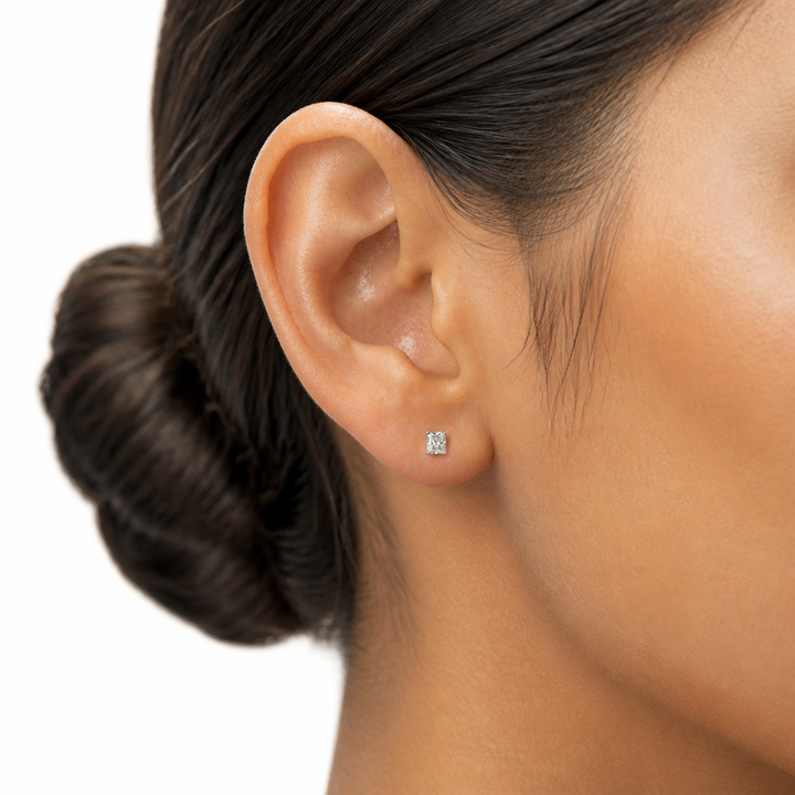 0.50 carat radiant cut lab-grown diamond stud earrings in four-prong settings