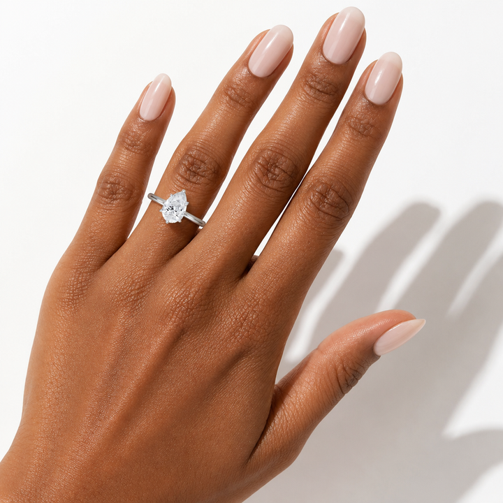Pear Solitaire Ring With Hidden Halo