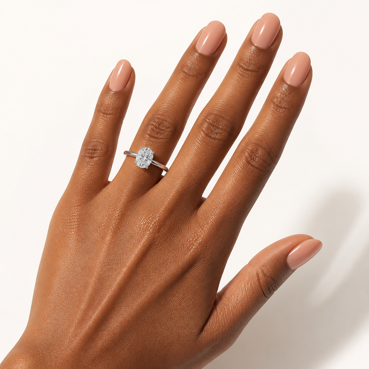 Oval Solitaire Ring With Diamond Basket