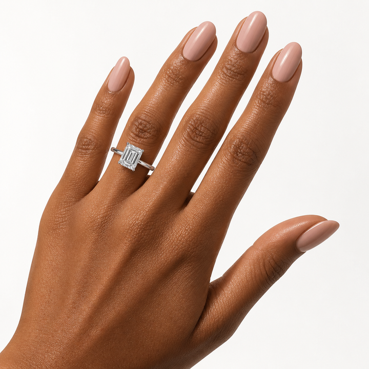 Emerald Solitaire Ring With Diamond Basket