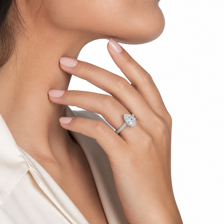 Pear Diamond Basket With Three Row Pave Ring