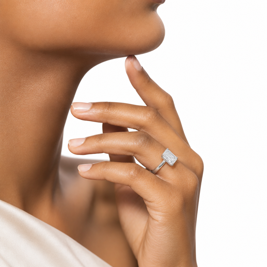 Emerald Solitaire Ring With Diamond Basket
