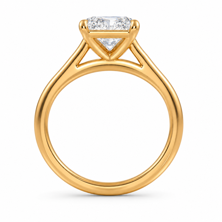 Side profile of an elongated cushion diamond solitaire ring in yellow gold with a cathedral setting and plain polished band.