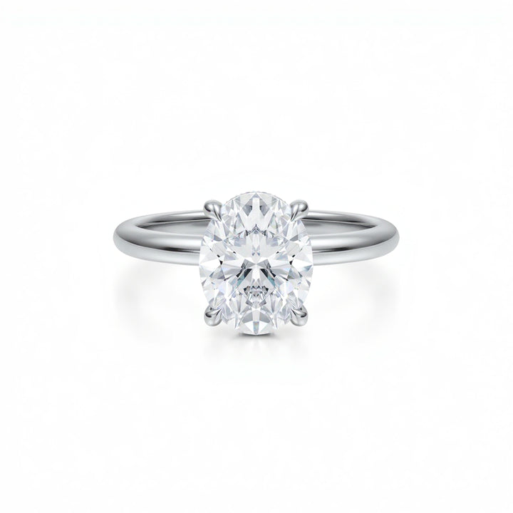 Oval Solitaire Ring With Diamond Basket