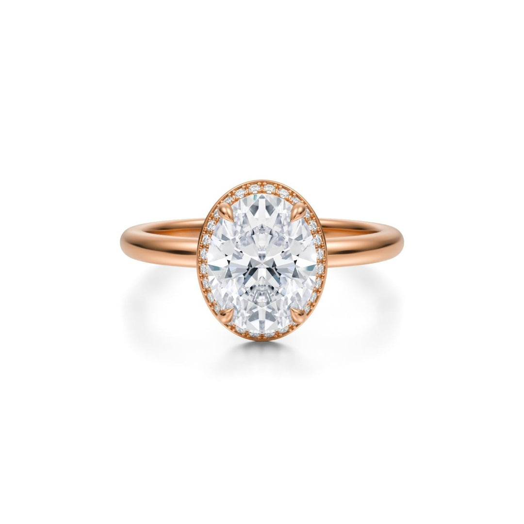 Oval Knife Edge Halo With Solitaire Ring