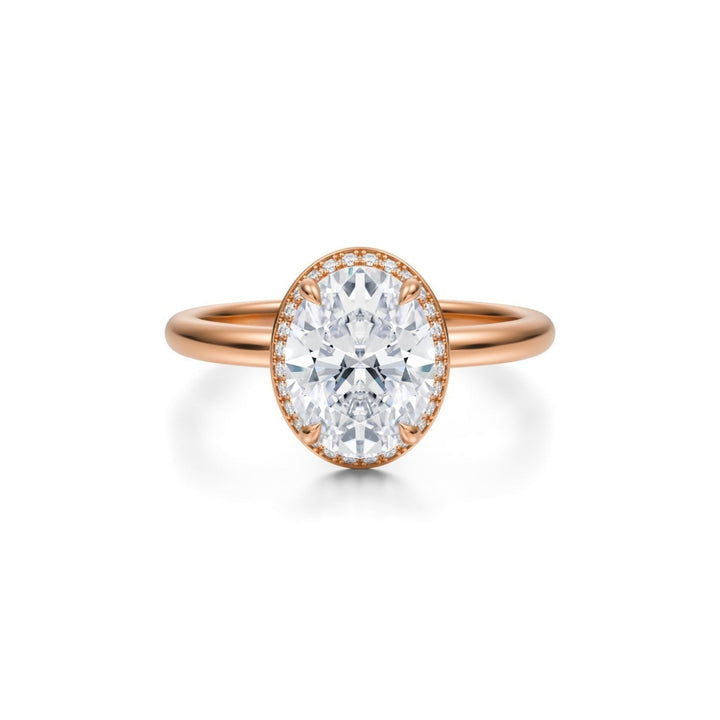 Oval Knife Edge Halo With Solitaire Ring