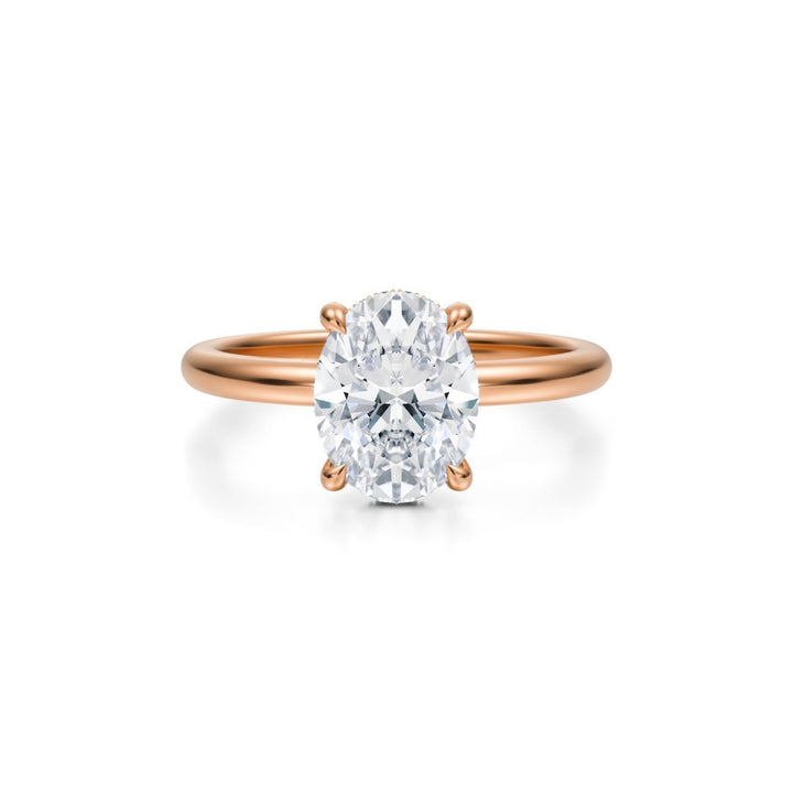 Oval Solitaire Ring With Pave Basket