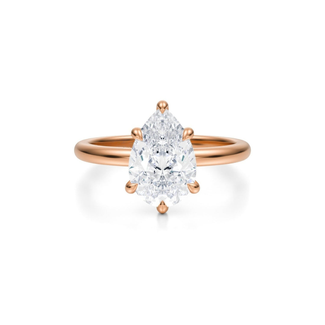 Pear Solitaire Ring With Pave Prongs