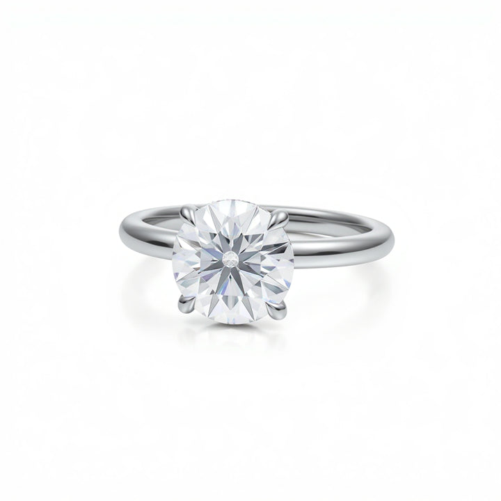 Round Solitaire Ring With Diamond Basket