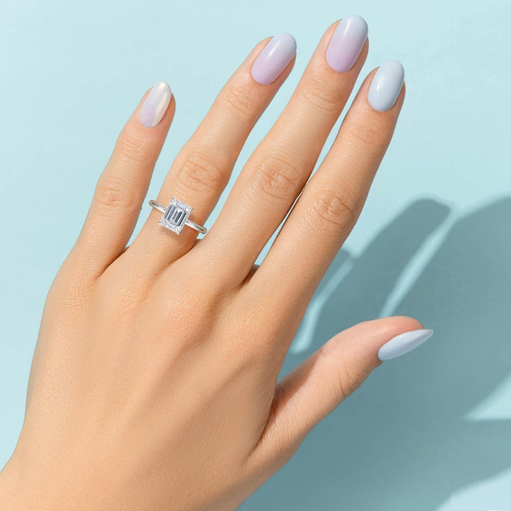 Emerald Solitaire Ring With Hidden Halo