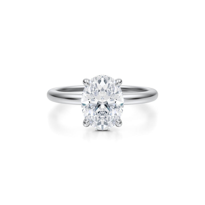 Oval Solitaire Ring With Pave Basket