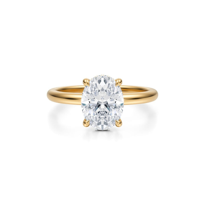 Oval Solitaire Ring With Pave Basket