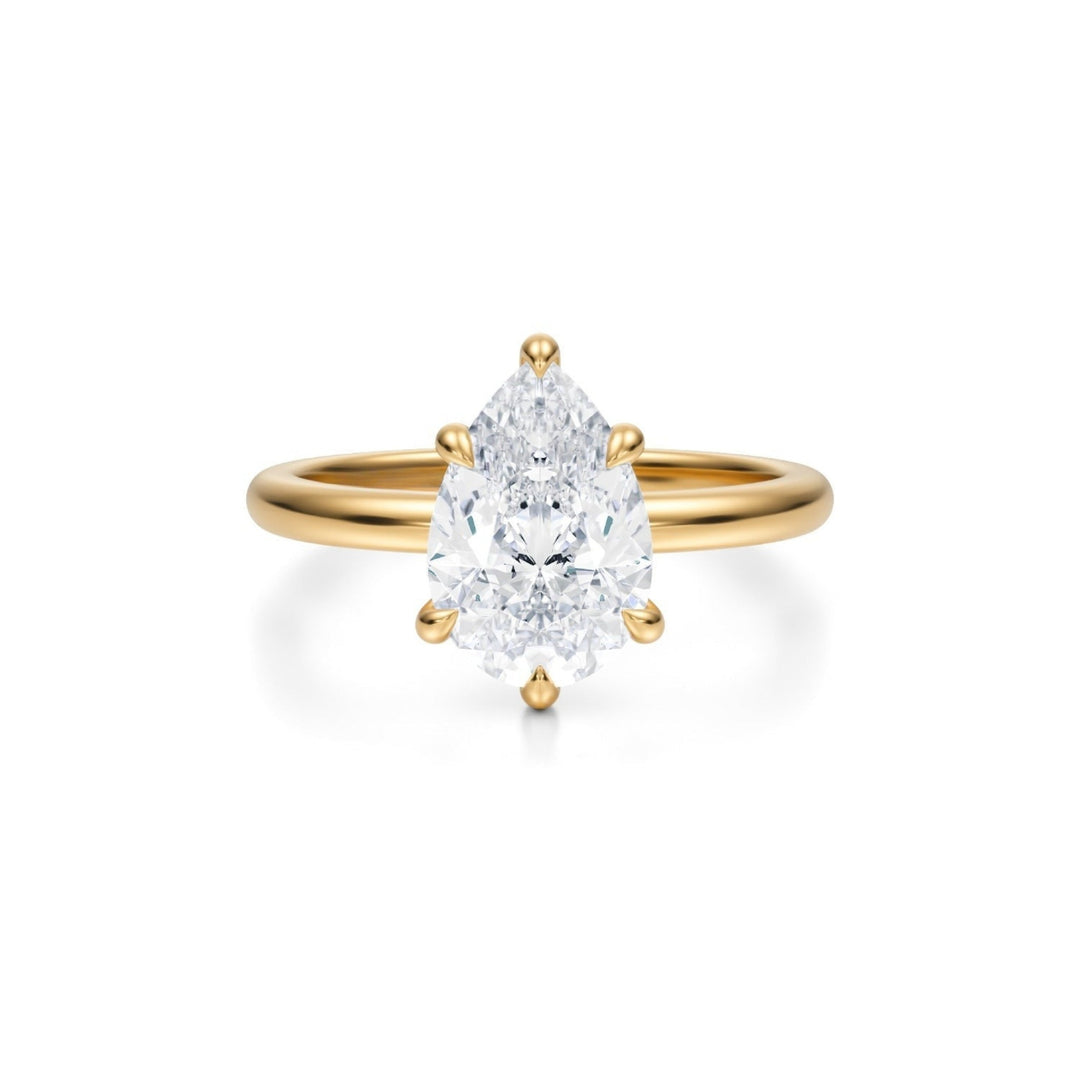 Pear Solitaire Ring With Pave Prongs