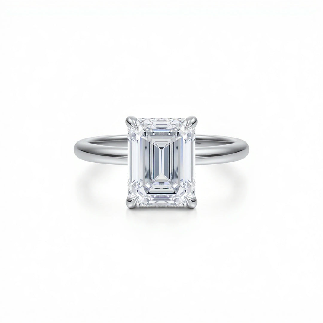 Emerald Solitaire Ring With Diamond Basket