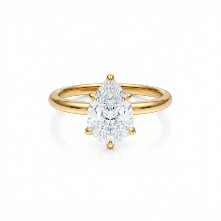 Pear Solitaire Ring With Diamond Basket