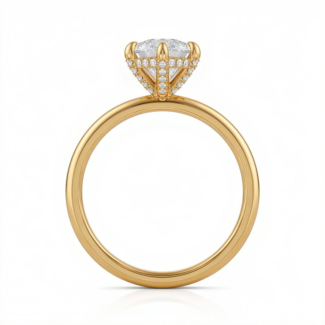 Pear Solitaire Ring With Diamond Basket