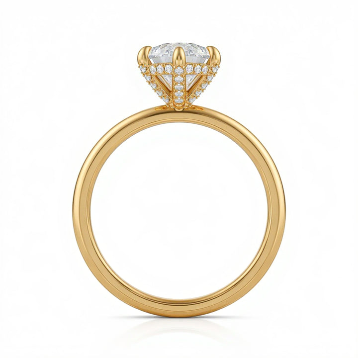 Pear Solitaire Ring With Diamond Basket