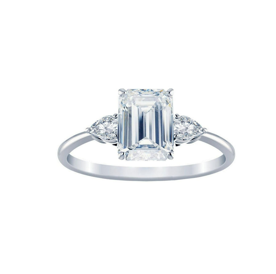 Emerald Trilogy Ring With Pear Side Stones