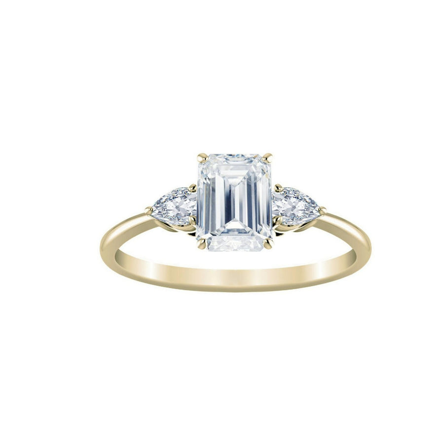 Emerald Trilogy Ring With Pear Side Stones