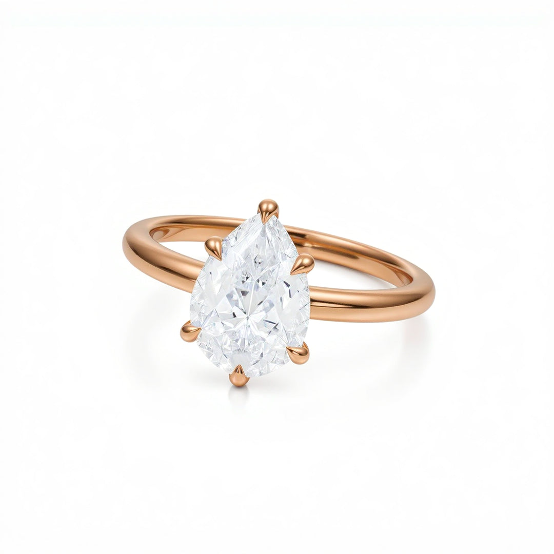 Pear Solitaire Ring With Pave Prongs