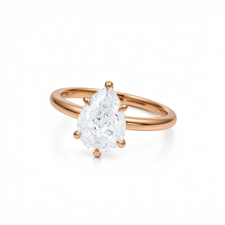 Pear Solitaire Ring With Pave Prongs