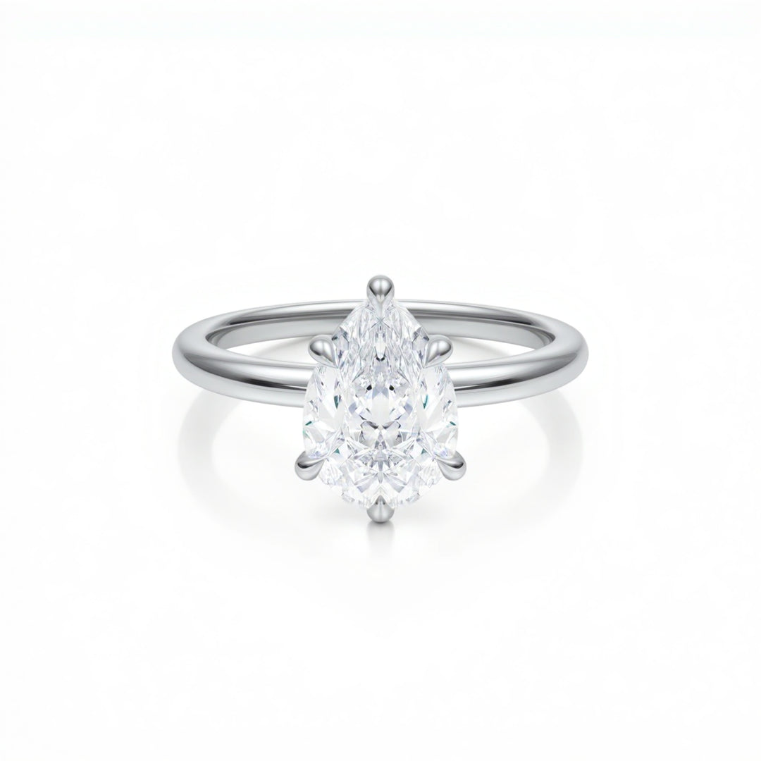 Pear Solitaire Ring With Pave Prongs